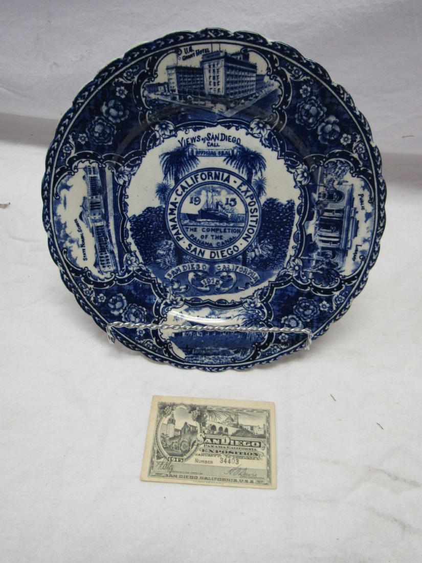 1915 British Anchor Flo-Blue Panama Exposition Plate: British Anchor 1915 Flo-Blue Panama Exposition Plate and Ticket. Plate depicts views of Santiago. Iin overall excellent condition. Marked England on back and British Anchor Feb. 19, 1913. Measures 9".