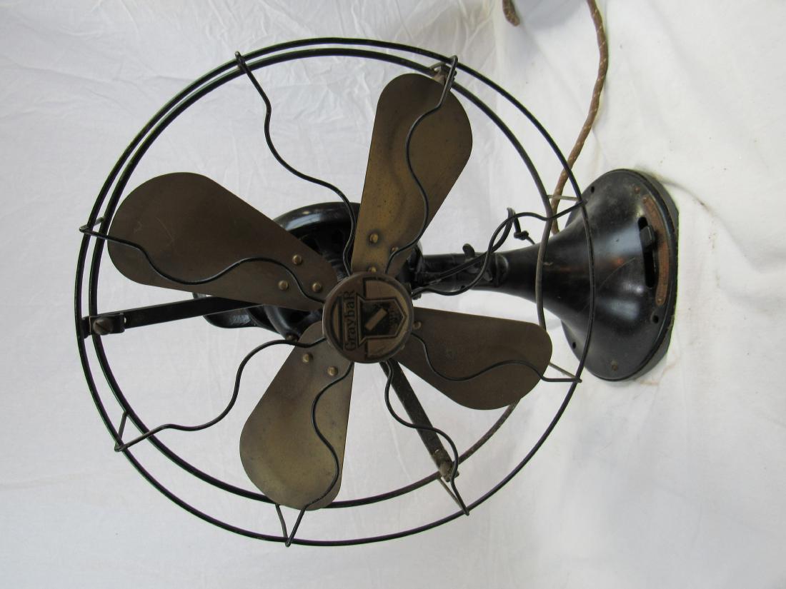 Graybar 3 Speed 4 Brass Bladed Fan: Graybar 3 Speed 4 Brass Bladed Fan, type AOU. In excellent working condition, crack in the gear box as photographed. Cage measures 13" across.