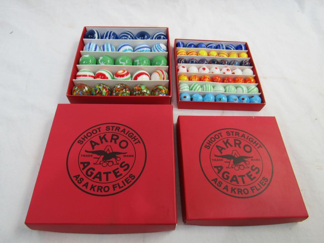 Agates Shooting an Mibs Marbles: Lot of 12 Shooters and 49 mibs Shoot Straight AKRO Agates Shooting Marbles. All in excellent condition.
