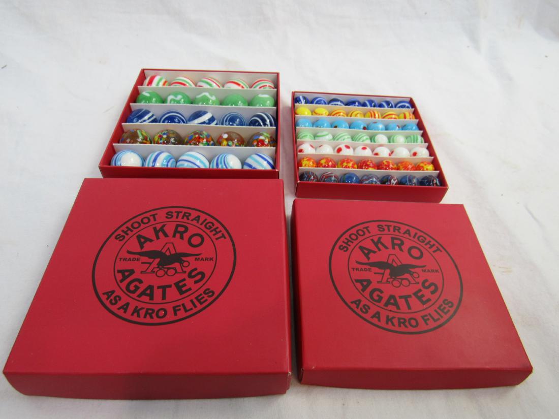 Agates Shooting an Mibs Marbles: Lot of 12 Shooters and 49 mibs Shoot Straight AKRO Agates Shooting Marbles. All in excellent condition.