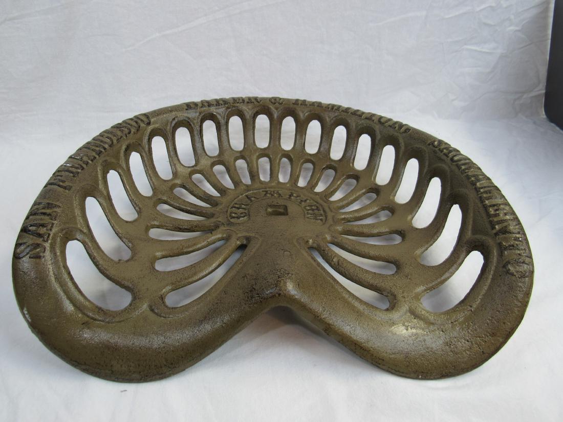 Baker and Hamilton Tractor Seat: Baker and Hamilton Tractor Seat. Measures 18.5 x 14"
