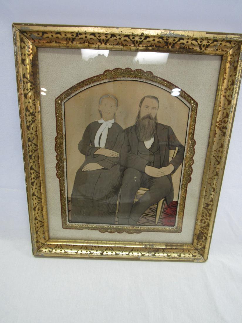 Antique Primitive Rendition of Mississippi Couple: Antique Hand Tinted Albumen Photograph of Mississippi Couple in primitive folk art frame and matte. In overall good condition. Measures 11.5x13.5"