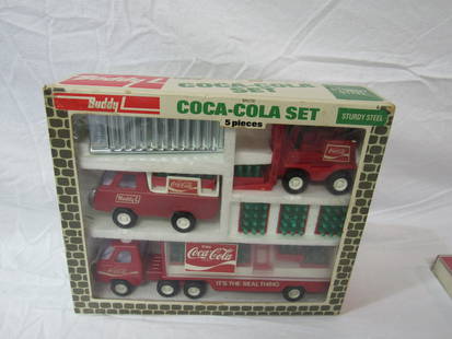 1976 Buddy L Brute Coca-Cola Set NOS: 1976 Buddy L Brute Coca-Cola Set NOS. Set includes fork lift, small delivery truck, large delivery truck, cases of bottles, and loading ramps. Fork lift measures 4.5", sm delivery truck 4.75", lg deli