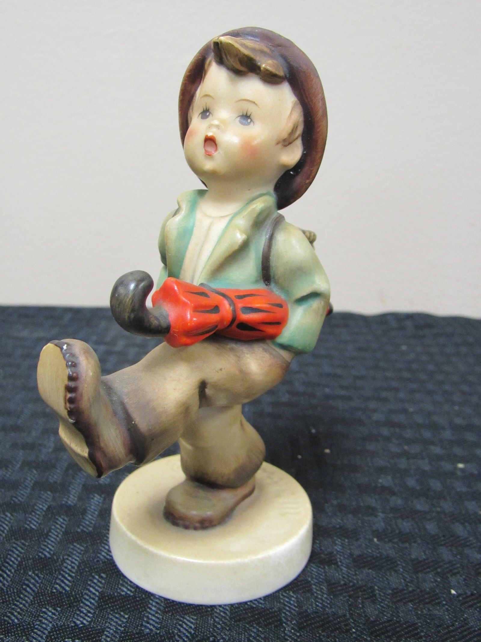 Vintage Goebel Hummel Figurine "Globe Trotter": Vintage Goebel Hummel Figurine "Globe Trotter". Repair in hat, as photographed. Excellent condition. 5.25" tall