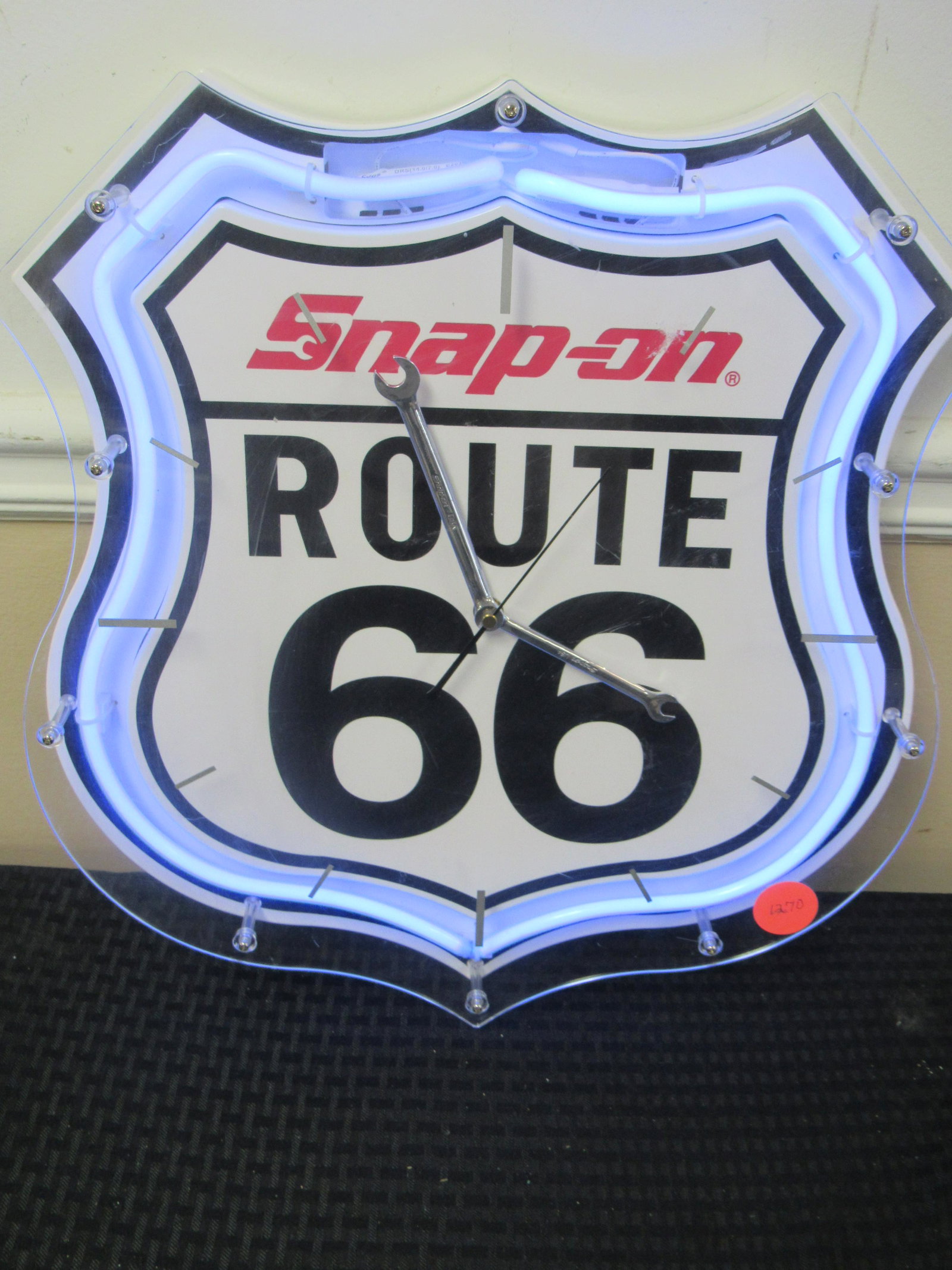 Snap-on Route 66 neon clock: Snap-on Route 66 neon clock. Excellent working condition. Clock is plug in and battery powered. 17.5" x 16"