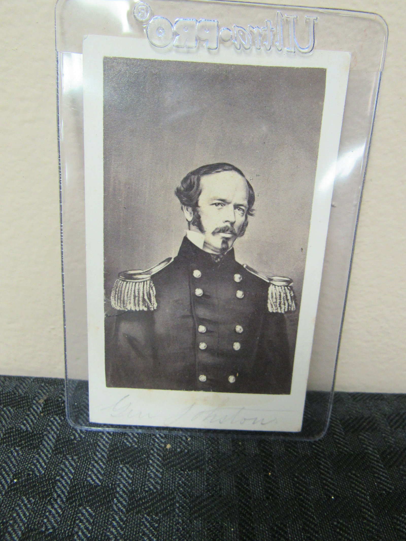 Lithograph Carte de Viste (CDV) of Confederate General: Lithograph Carte de Viste (CDV) of Confederate General Johnston. Backmark on CDV reads "From Geo. S. Tolman Fancy Goods Warehouse 255 Washington St Boston". Very good condition. 4" x 2.5"