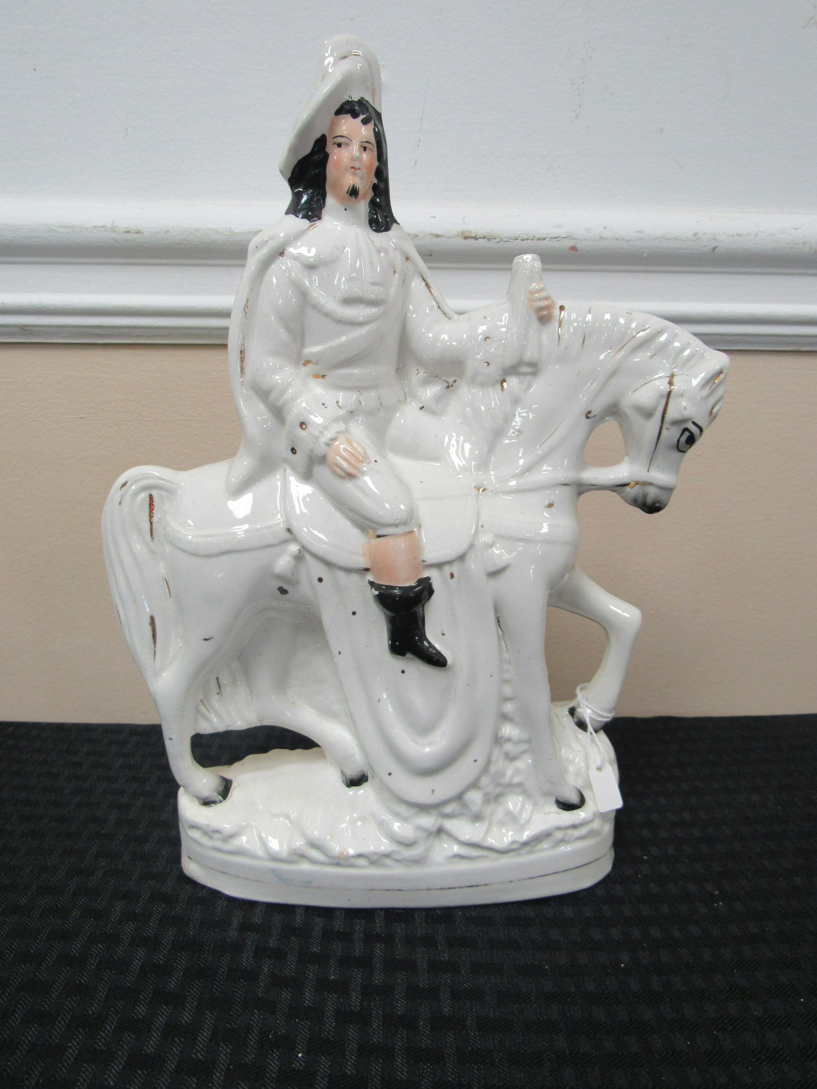 Royal Staffordshire Figurine depicting Man on Horse.: Royal Staffordshire Figurine depicting Man on Horse. Very good condition. 13" tall. Manifest #548