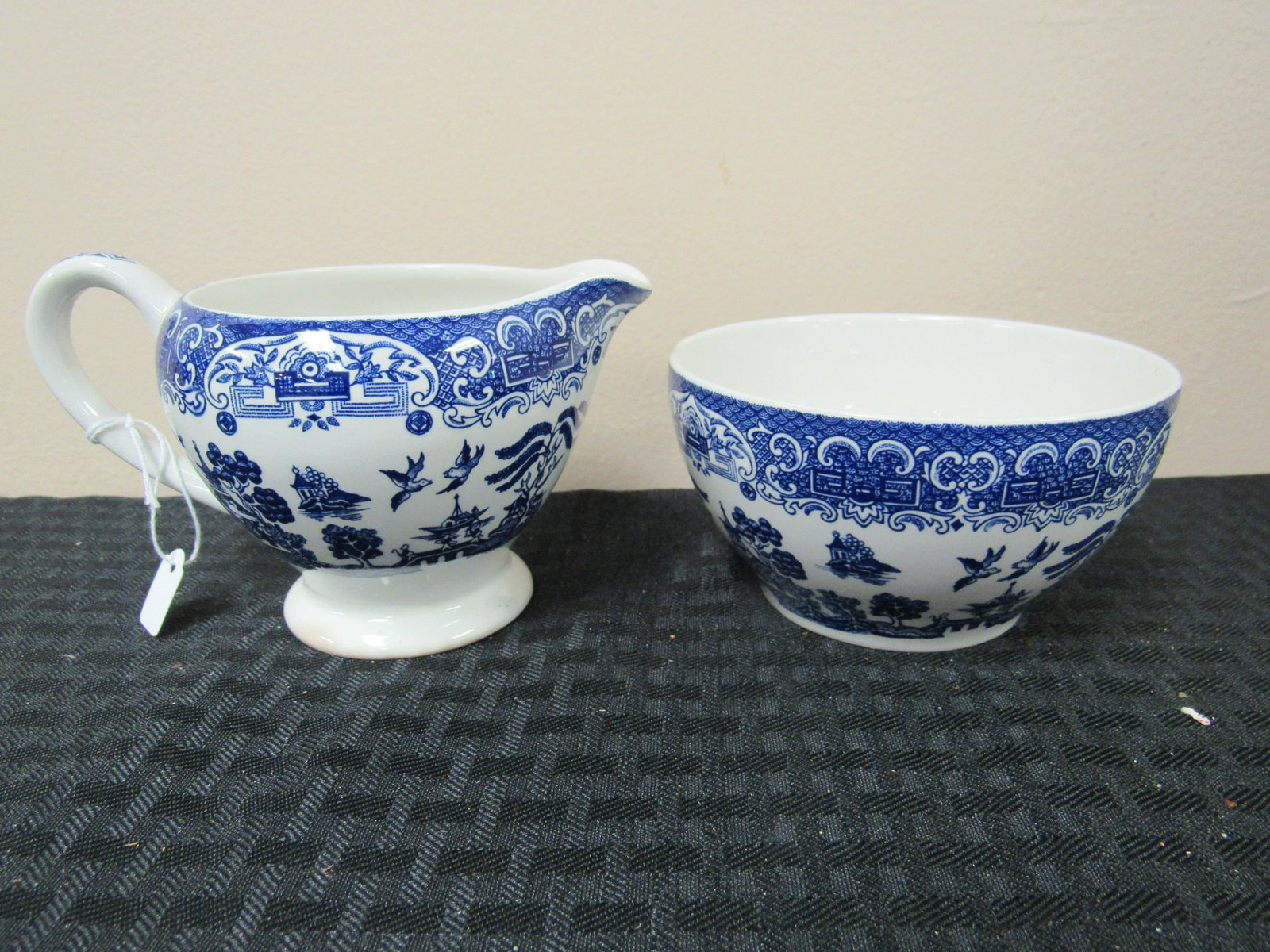 English Ironstone "Old Willow" Sugar and Creamer: English Ironstone "Old Willow" Sugar and Creamer. Excellent condition. Creamer 3.5" x 5.75", Sugar Bowl 2.5" x 4.5". #571 and 572