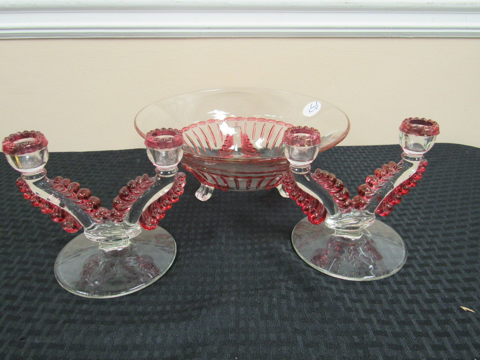 Elegant Clear and Cranberry Footed Bowl and Candlestick: Elegant Clear and Cranberry Footed Bowl and Candlestick Set Possibly Cambridge. Excellent condition. Bowl 4" x 12.5", Candlesticks 6.5" x 5.75"