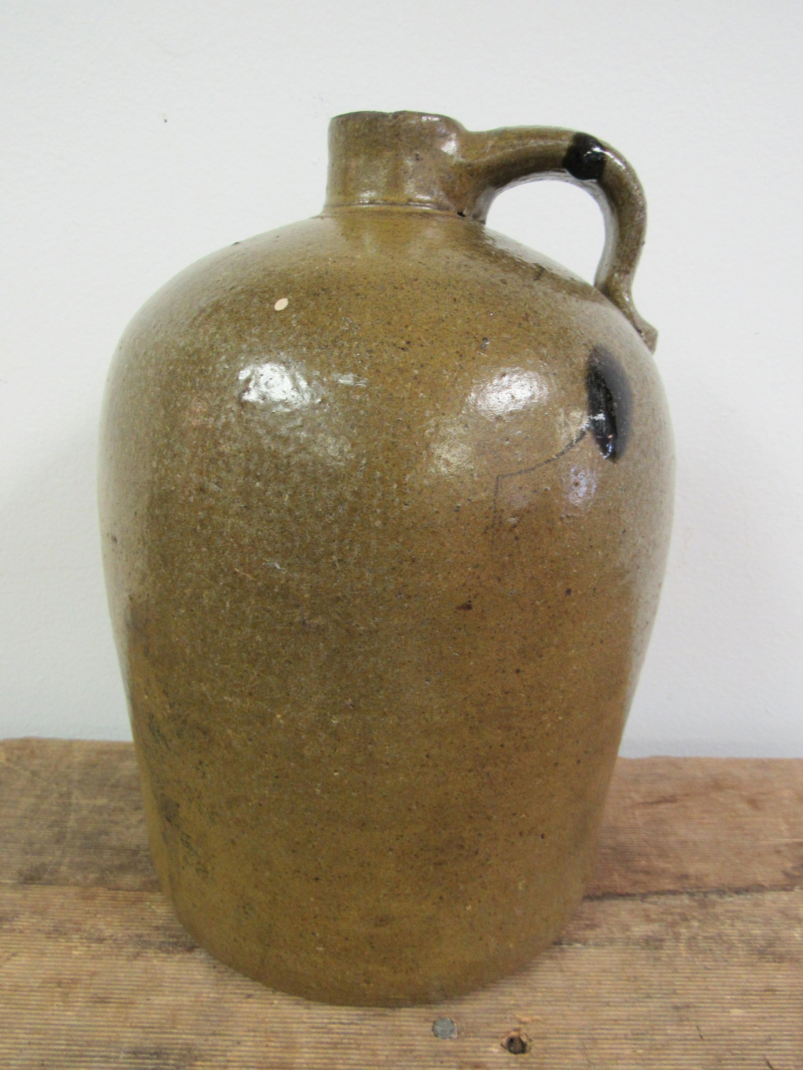 Early Fulton Co. Georgia (Howell Mill) 1 Gallon Jug: Early Fulton Co. Georgia (Howell Mill) 1 Gallon Jug. Very good condition. Chigger bite in spout, as photographed. Small portion of glaze missing from kiln firing. 10.5" x 7"