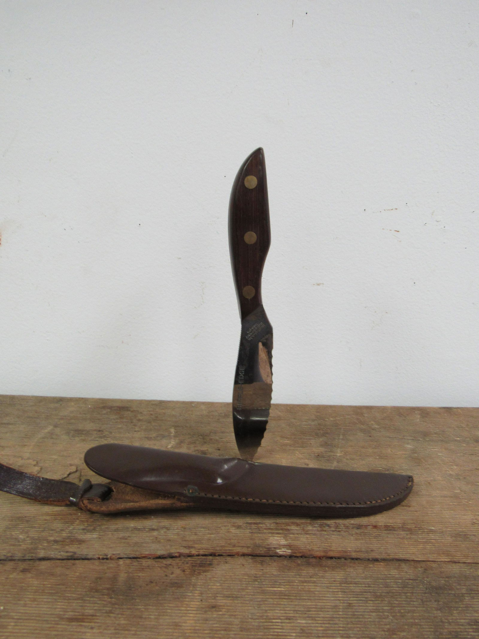 Ideal Products Inc. Solingen, Germany Ripple Edge: Ideal Products Inc. Solingen, Germany Ripple Edge Custom Handmade Knife in Leather Sheath. Very good condition. Blade measures 4.5, Knife 8"