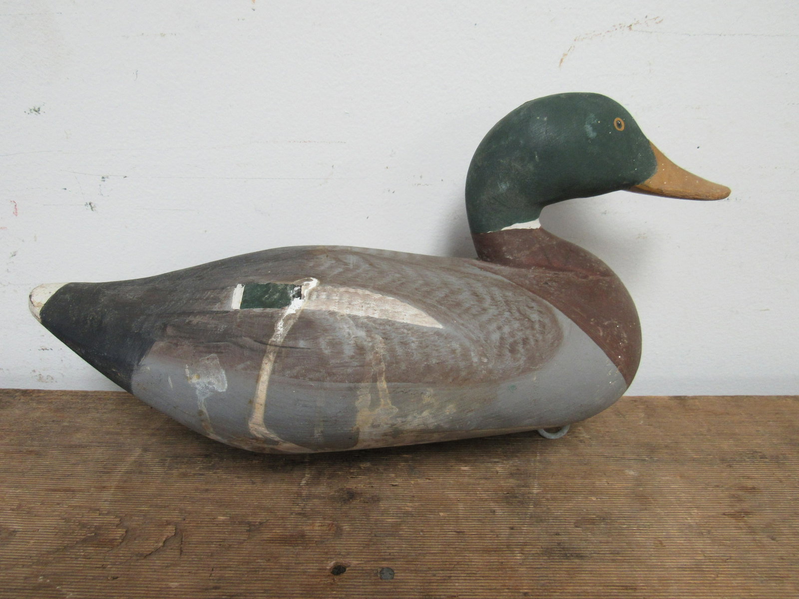 Paul Gibson (1902 - 1984) Handcarved Mallard Drake: Paul Gibson (1902 - 1984) Handcarved Mallard Drake Decoy with Original Weight. Damage to face, as photographed. 15" x 6.5"