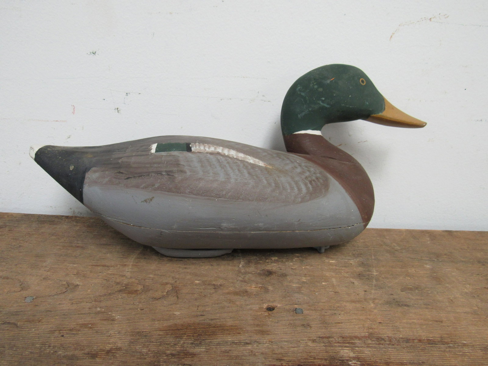 Paul Gibson (1902 - 1984) Handcarved Mallard Drake: Paul Gibson (1902 - 1984) Handcarved Mallard Drake Decoy with Original Weight. Crack on side, as photographed. 15" x 6.5"