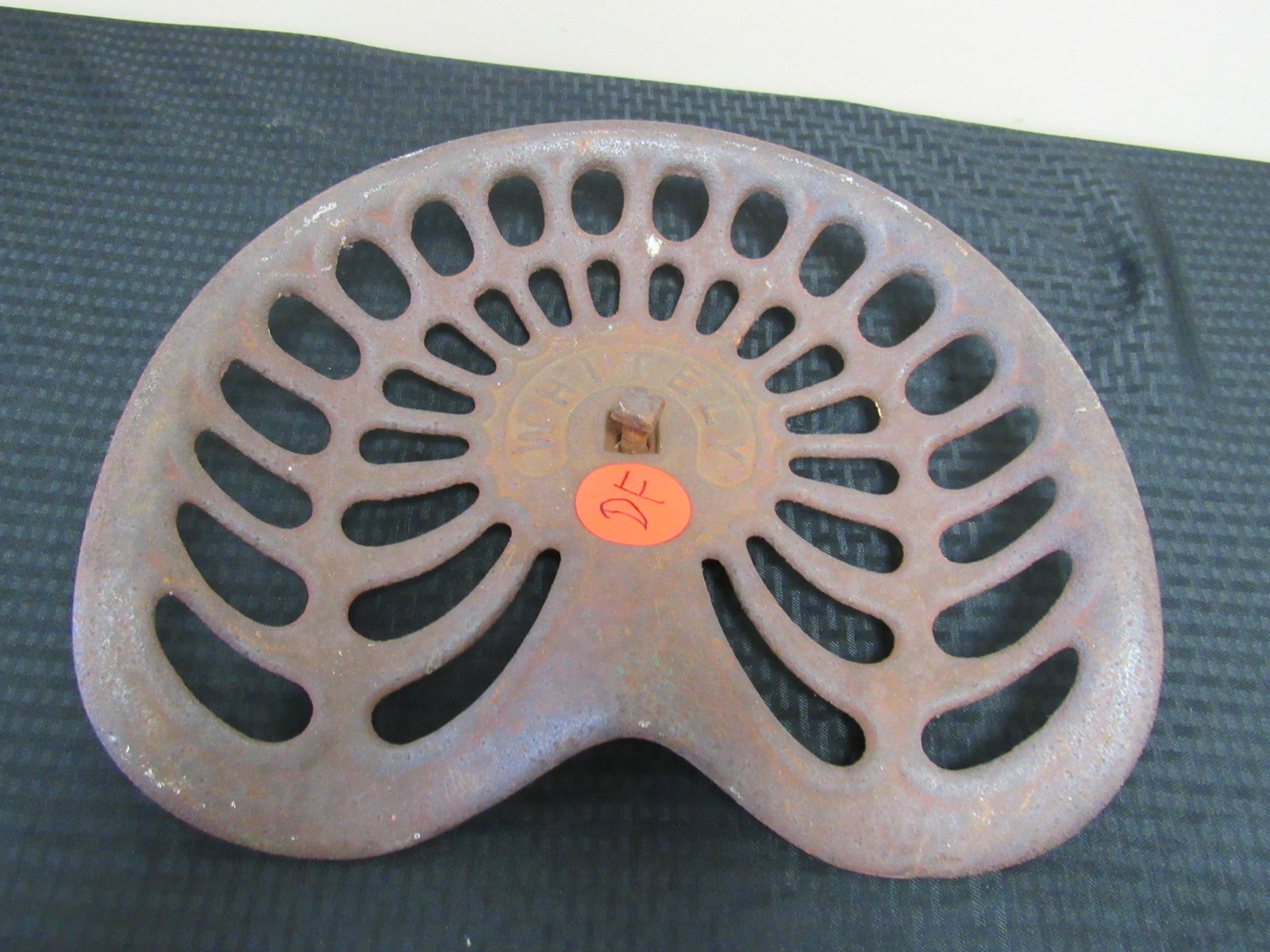 Antique Whitely Cast Iron Tractor Seat: Antique Whitely Cast Iron Tractor Seat. Very good condition. 14" x 16.25"