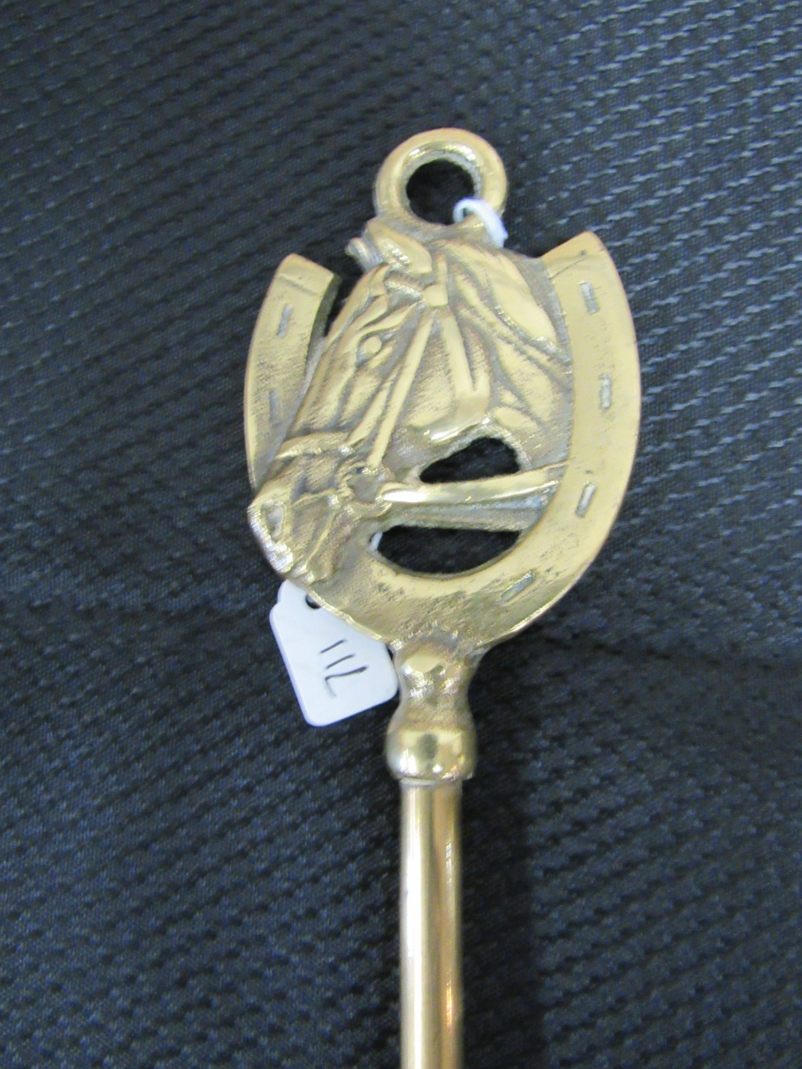 Vintage Brass Shoehorn with Horse and Horseshoe Design: Vintage Brass Shoehorn with Horse and Horseshoe Design (Item No. 711). Very good condition. 18"