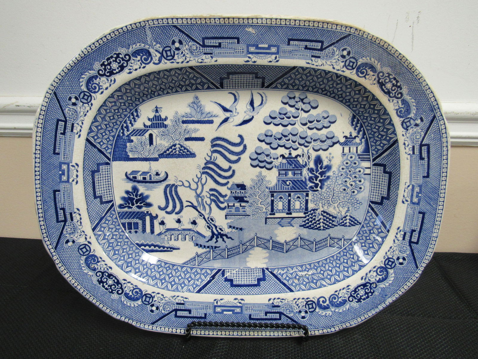 Antique English Burslem Flo Blue Platter in Blue Willow: Antique English Burslem Flo Blue Platter in Blue Willow Pattern (Item No. 682). Very good condition with some crazing on bottom and small hairline crack, as photographed. 17.5" x 14"