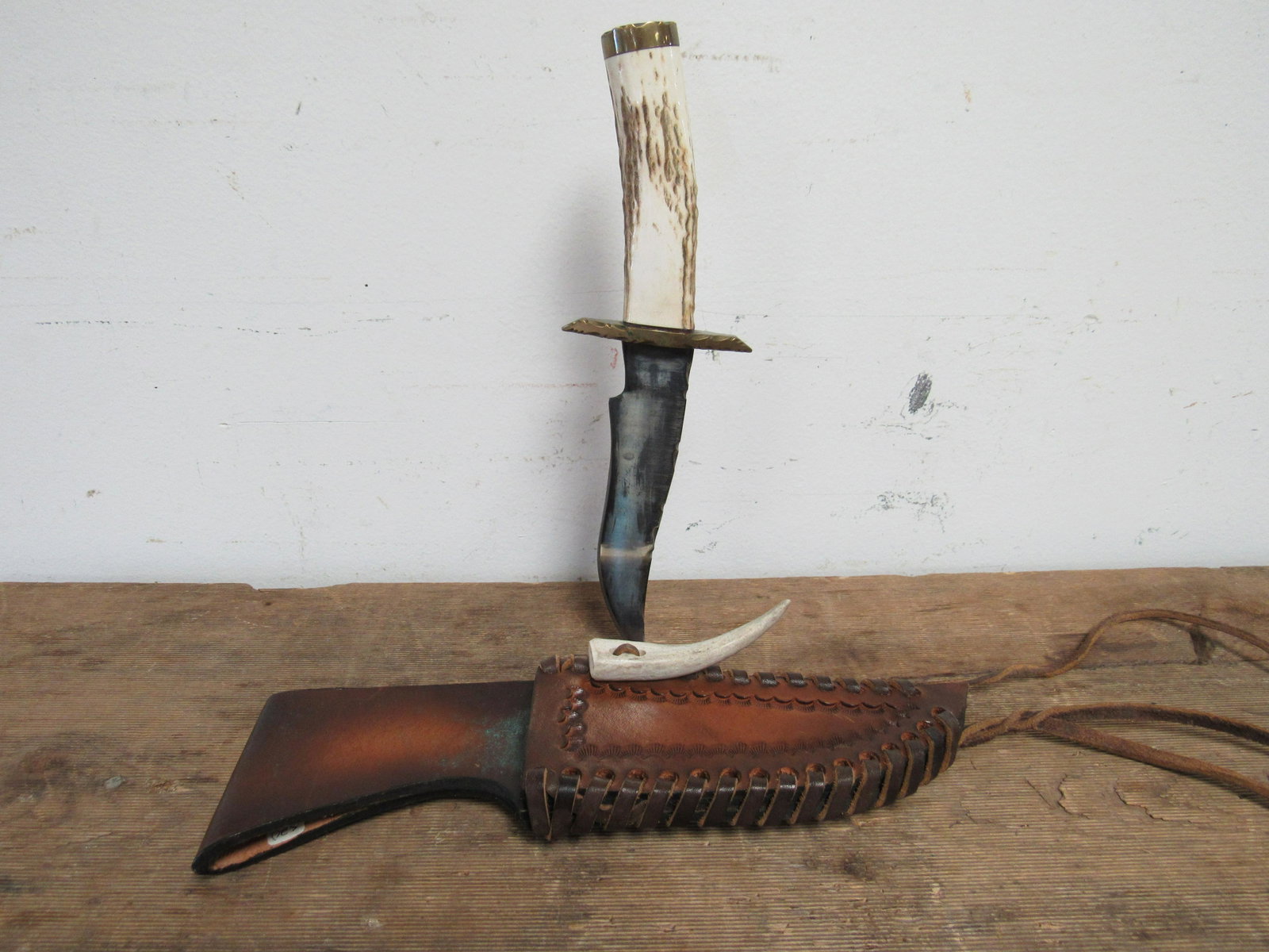 Custom RCS Fixed Blade Handmade Hunting Knife with: Custom RCS Fixed Blade Handmade Hunting Knife with Handmade Bodean Leather Sheath. Knife marked with rattlesnake insignia on back. Antler handle. Overall measures 10.25", Blade 5.75"