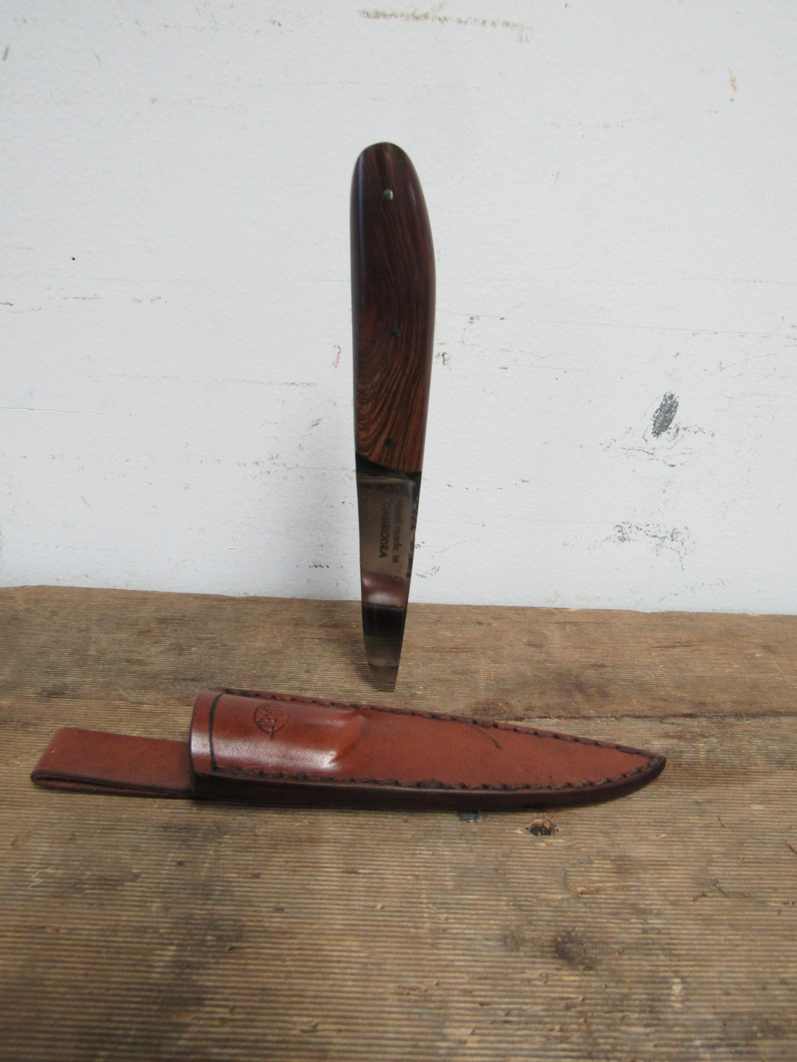 Vintage Cambodian Handmade Hunting Knife: Vintage Cambodian Citadel Handmade Hunting Knife in original leather sheath, exotic wood handle. Overall measures 7.75", Blade 4"