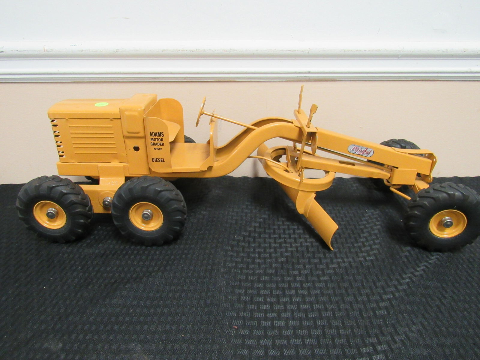 Early Doepke Model Toys Pressed Steel Motor Grader: Early Doepke Model Toys Pressed Steel Motor Grader. Professionally restored and in excellent condition. 25.5" x 8.5"
