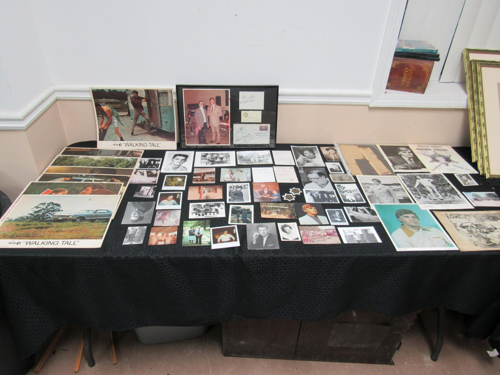 Large Lot of Buford Pusser/ Walking Tall Lobby Cards,: Large Lot of Buford Pusser/ Walking Tall Lobby Cards, Pictures, Signatures and Other Ephemera. Lot includes: Tennessee Sheriff Buford Pusser, snapshots, candid photos, newspaper clipping, walking tall