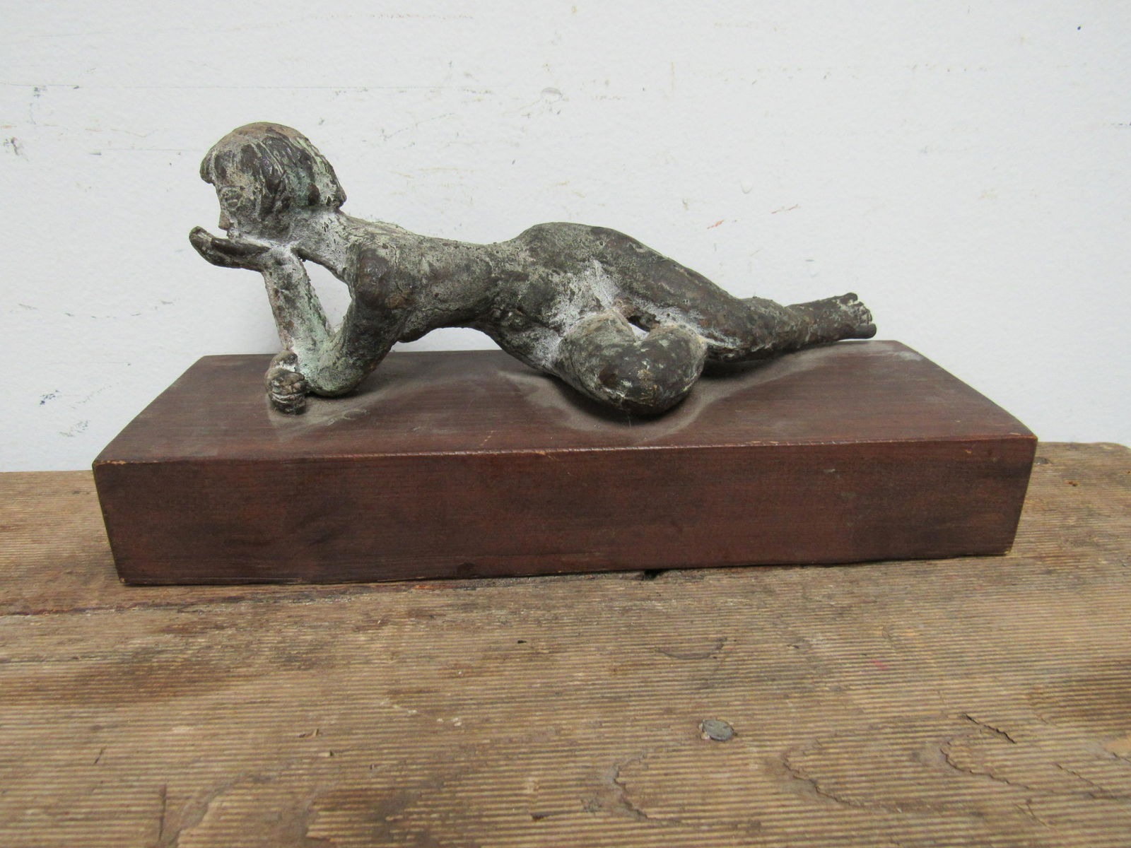 Paulina Everitt (1905-1996) Bronze Sculpture of: Paulina Everitt (1905-1996) Bronze Sculpture of Reclining Nude. Very good condition and resting on original wooden base. Sculpture measures 9" x 3.25". Overall measures 10.25" x 5" 3.5"