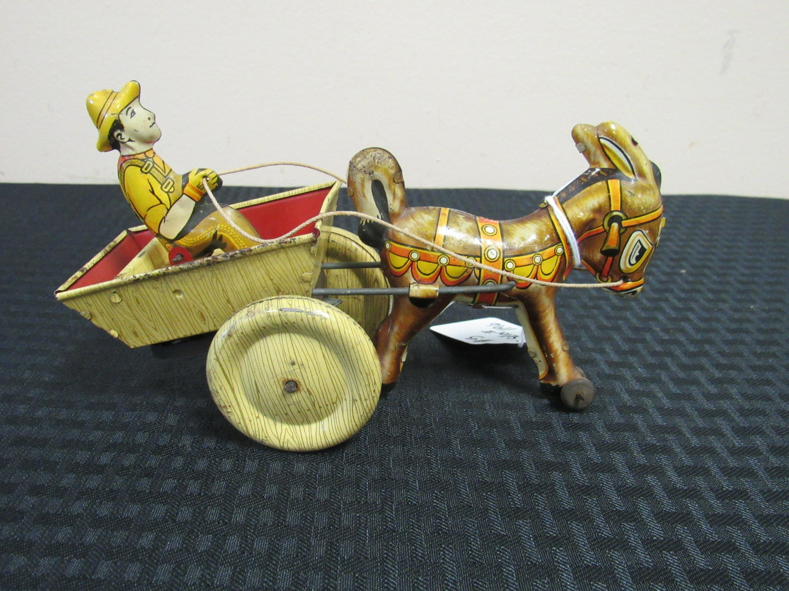 Circa 1940's Marx "Balky Mule" Tin Litho Wind-up Toy: Circa 1940's Marx "Balky Mule" Tin Litho Wind-up Toy. Wind-up mechanism works. Very good condition. 8" x 3"