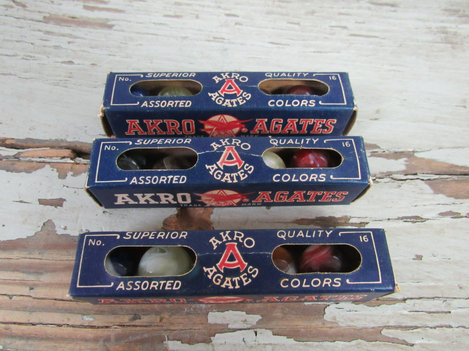 Lot of 3 Packs NOS Akro Agate Marbles: Lot of 3 Packs NOS Akro Agate Marbles. Each box contains 5 assorted color marbles #16 marbles. 3.75"