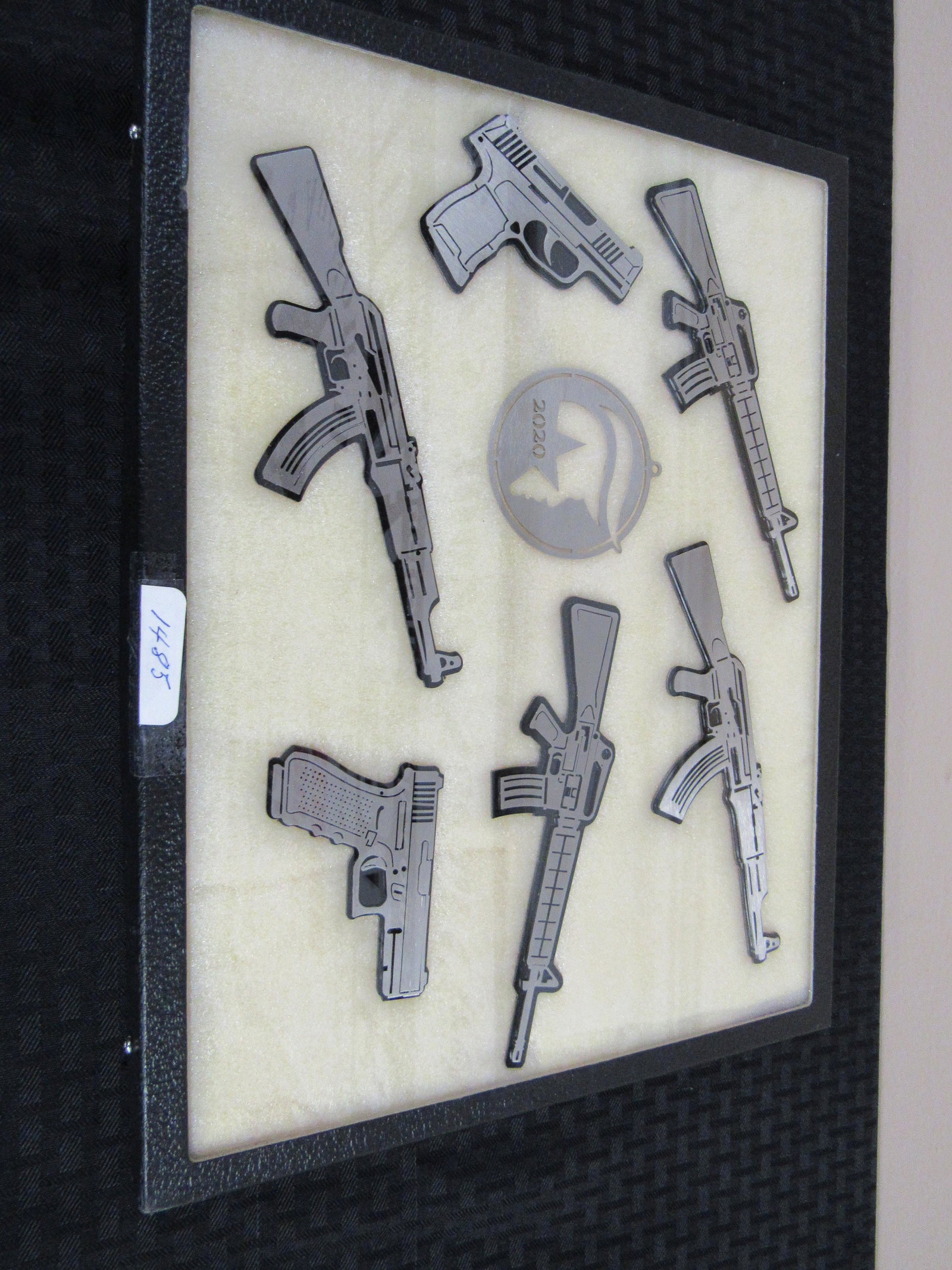 Lot of 6 Laser Cut Metal Guns and Trump Christmas: Lot of 6 Laser Cut Metal Guns and Trump Christmas Ornament. All in excellent condition. Guns vary in measurement with largest being 7.5", shortest 3.5"