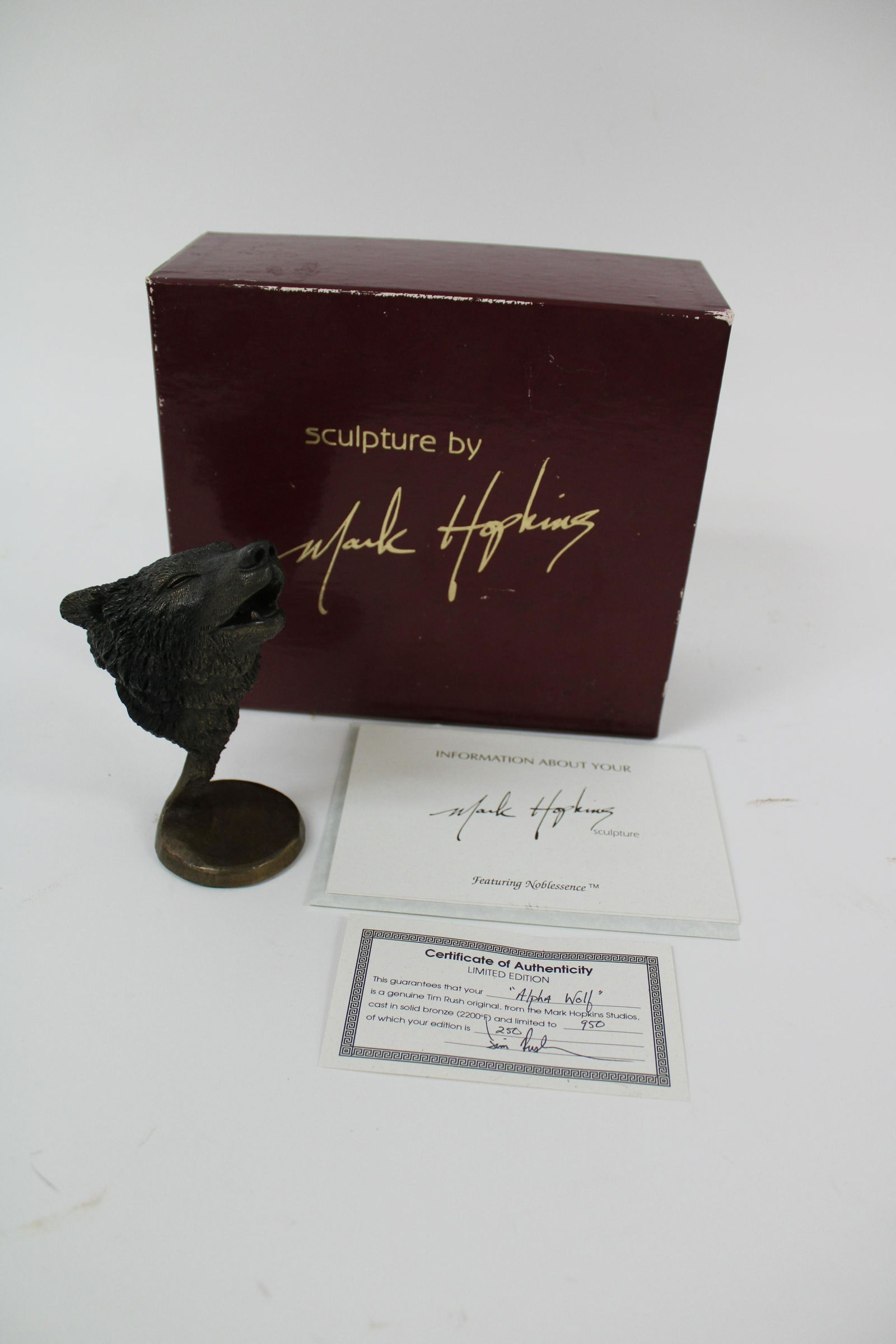 Mark Hopkins Bronze Sculpture Titled "Alpha Wolf" in: Mark Hopkins Bronze Sculpture Titled "Alpha Wolf" in Original Box. 250/950. Overall excellent condition. Measures 6" tall.