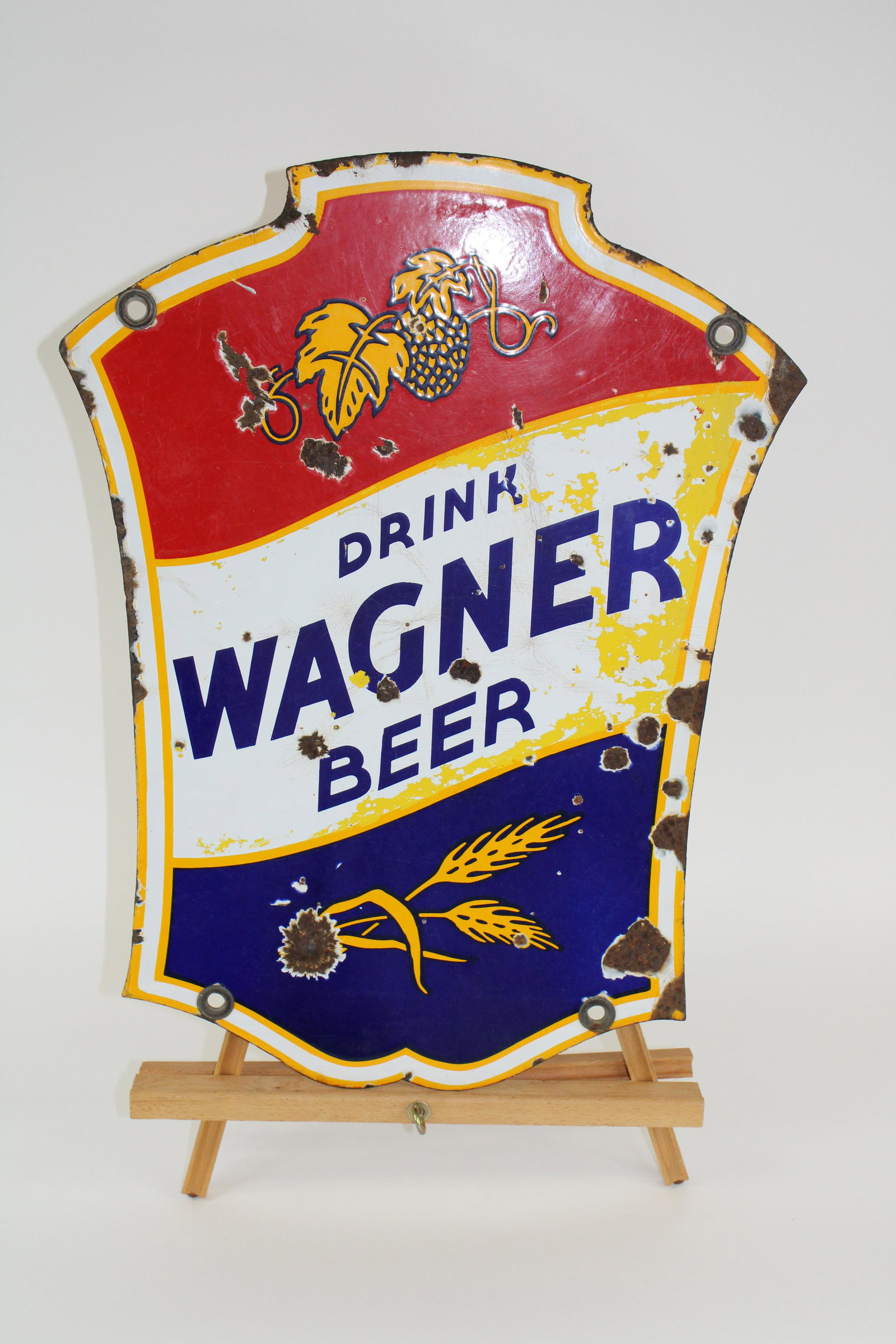 Circa 1935 24" x 15.5" DSP Drink Wagner Beer Heavy: Circa 1935 24" x 15.5" DSP Drink Wagner Beer Heavy Porcelain Double Sided Sign. Overall good condition. Has bullet hole and major chipping on field on either side and slight paint on either side. 6.5/