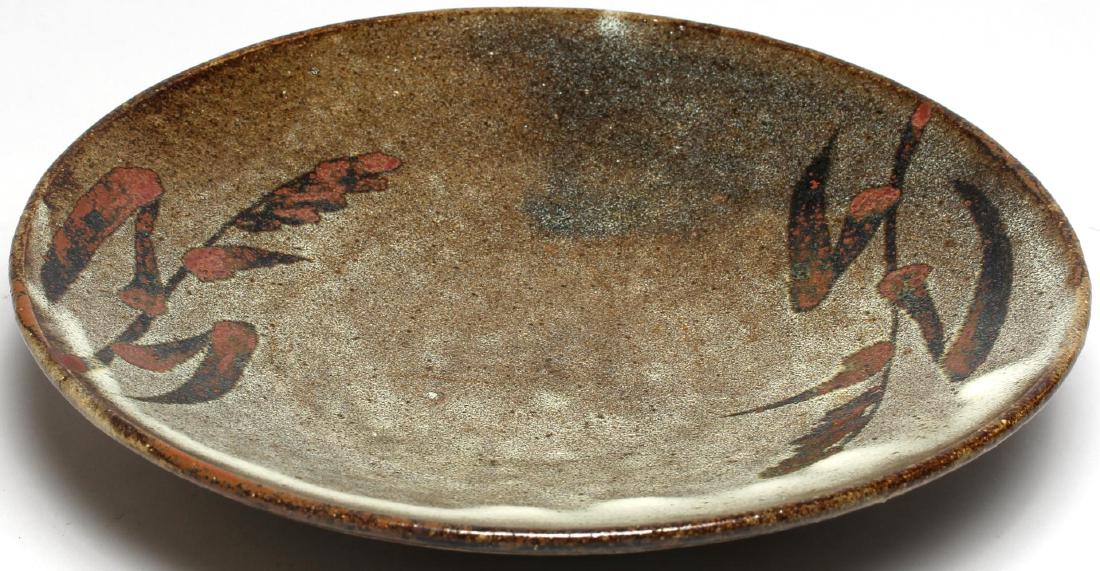Japanese Slip-Glazed Pottery Dish: Displaying wheat sheaves under white slip suggesting a cloud bank. 10.75" diameter. Minor glaze imperfection to interior surface.