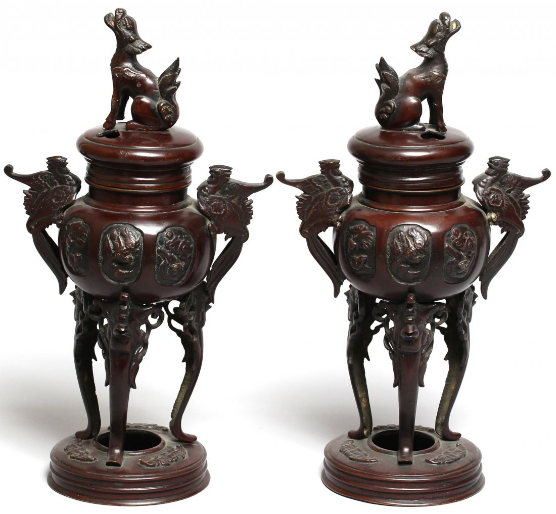 Pair of Chinese Bronzed Metal Incense Braziers: Of temple form, with qilin finials and phoenix handles, the bases cast with bats. 13" H. One finial reattached.