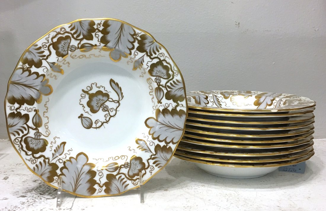 Copeland Spode for Tiffany Salad Bowls, Set of 11: Gilt English porcelain, each marked underneath. 8.5" diameter. Two with rim chips, one further with old hairline crack.