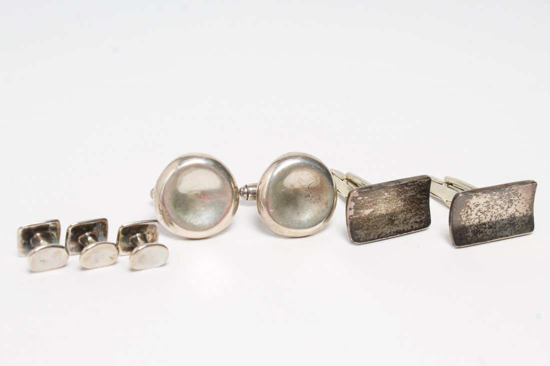 Sterling Silver Cufflinks, incl. Robert Lee Morris: Men's jewelry, a set of Robert Lee Morris cufflinks and shirt studs in a black bag, all marked "RLM 925;" and a set of sterling cufflinks stamped "Mexico 925." Largest: .90" L. Approx. 1 ozt.