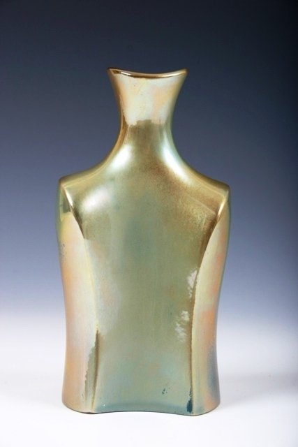 Zsolnay Green & Blue Lustre Bottle - EVA Zeisel: Signed by Hungarian artist on the bottom as well as: EVA Zeisel. C. Layers of green lustre paint worn in some areas to expose blue under paint. No cracks, chips, or repairs. 6 3/8" x 3 1/8" 2 1/4"