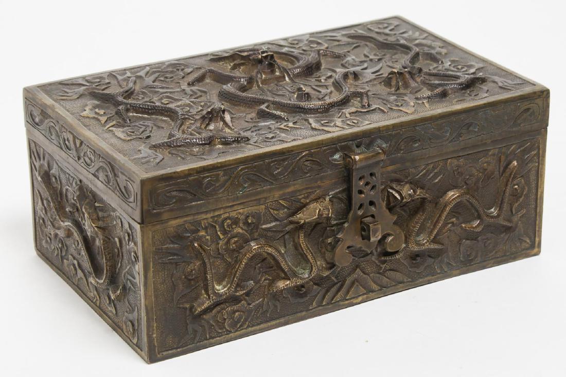 Japanese Antique Box, Metal with Repousse Dragons: Japanese box, gilt metal, with geometric repousse dragon motifs; Asian art. 4" H X 9.25" W X 5.75" D.