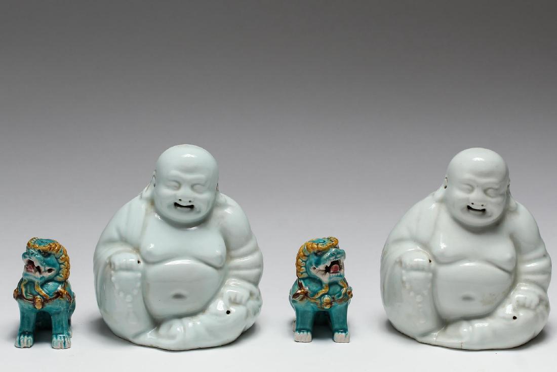 Chinese Export Porcelain Figurines, Group of 4: Chinese Laughing Buddha or Hotai figures, and a pair of foo dogs/ lions; Asian porcelain. Taller pair: 6.25" H. Occasional wear.