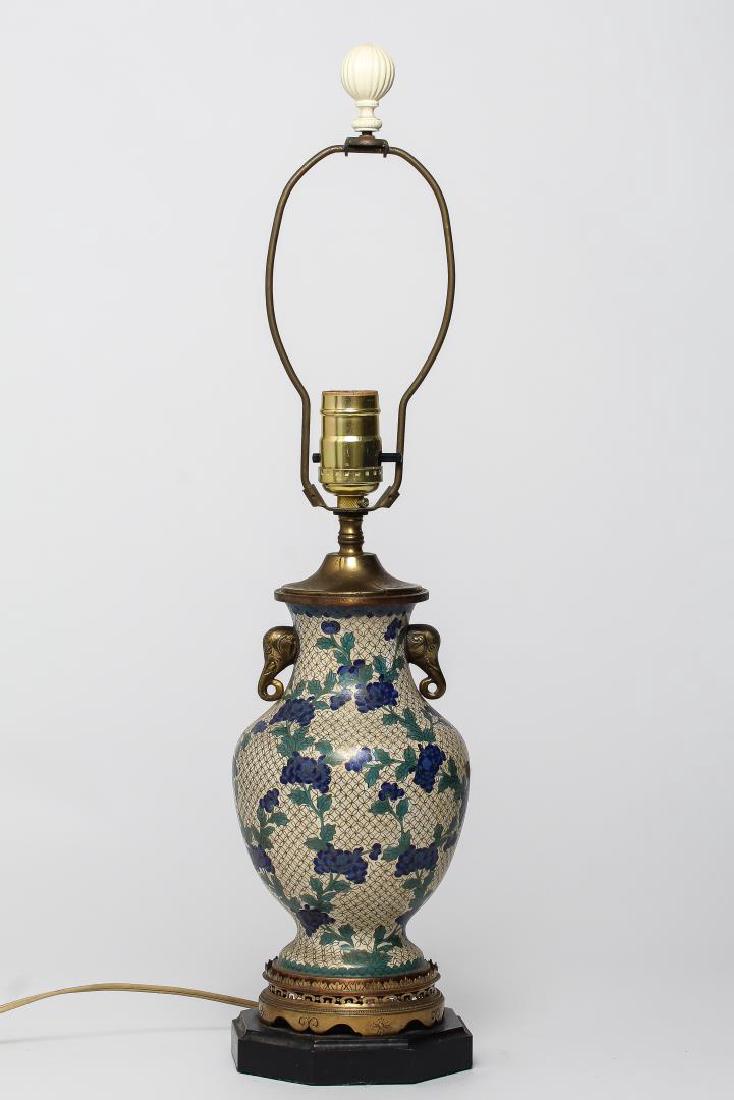 Chinese Champleve Lamp: Chinese champleve enamel, baluster-form with blue chrysanthemums and elephant heads, on wooden base; Asian art. 22.25" H.