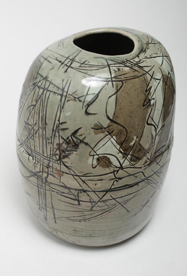 Regis Brodie (American, 20th C.)- Ceramic Vase: Regis Brodie ceramic pottery vase, 20th century, large shoulder vase, gestural design with celadon and earth-tone ground, bearing maker's mark on underside. 14" H.