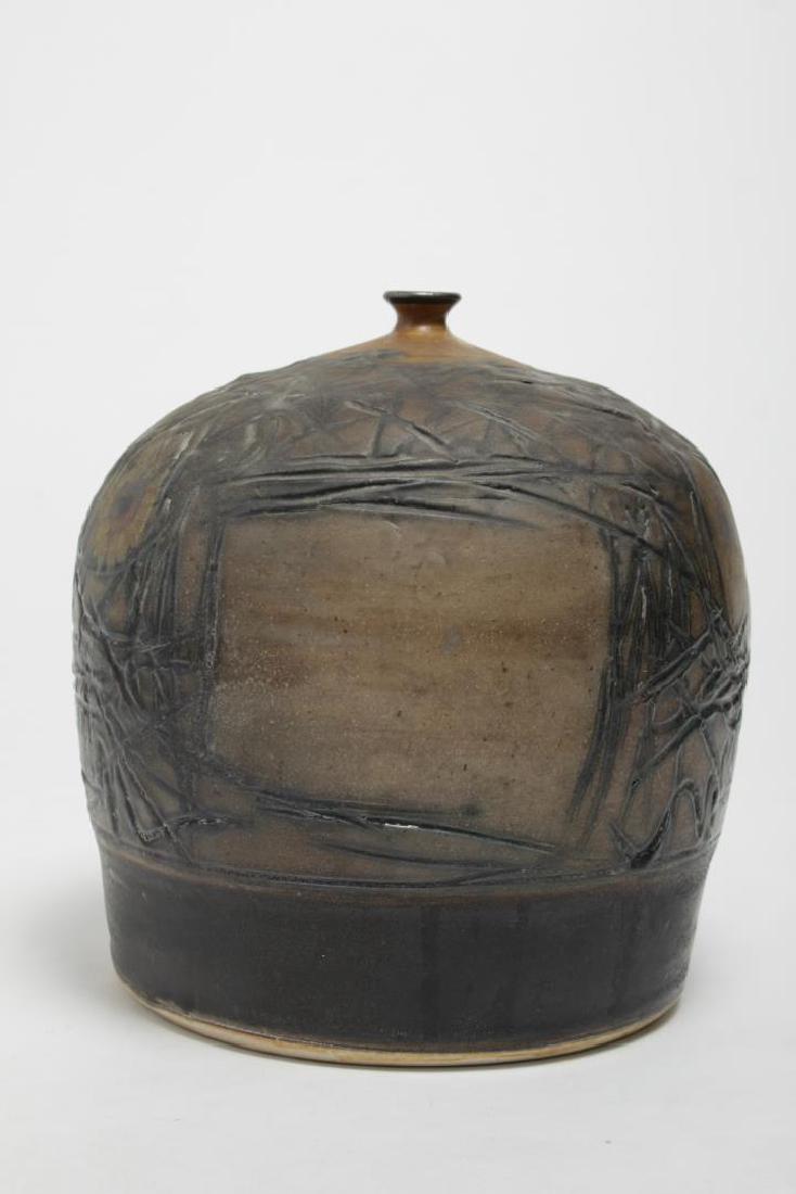 Regis Brodie (American, 20th C.)- Ceramic Vase: Regis Brodie ceramic pottery vase, circa 1970s, three sunflowers within incised geometric composition, bearing maker's mark on underside. 8"H.