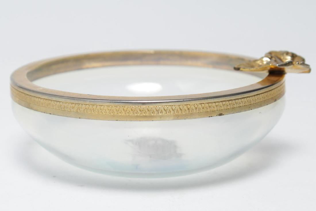 Italian Murano Glass Ormolu-Mounted Bowl: Venetian Murano glass bowl, iridescent with gilt metal/ormolu rim and leaf attachment, bearing original manufacturing label on underside.