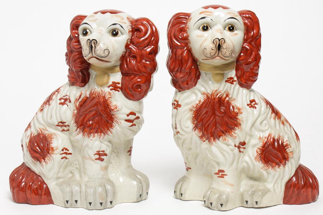 Staffordshire English Porcelain Dogs, Pair: Staffordshire dogs, English porcelain, brown and black features on white ground. 11.5" H X 9" W X 4.5" D.