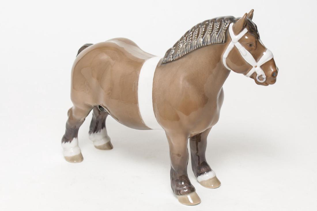 Bing & Grondahl Porcelain Horse "Belgian Stallion": Bing & Grondahl Danish underglazed porcelain horse figurine, "Belgian Stallion" #B2234, designed by Svend Jespersen, the undersides of the two front hooves with company and 1952-1957 date marks. 10.25