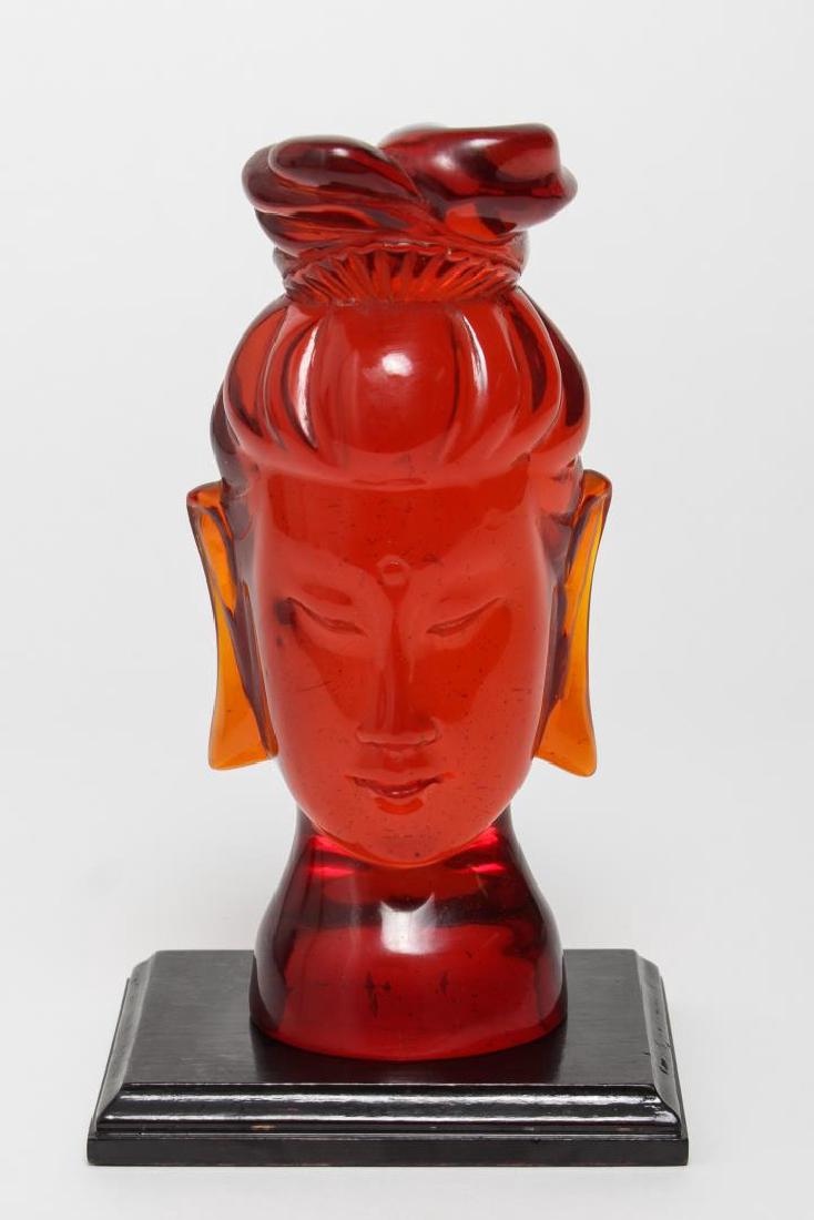 Asian Head of Guanyin, in Reconstituted Amber: Asian head of Buddhist deity Guanyin, likely Chinese or Japanese, reconstituted amber. 8" H.
