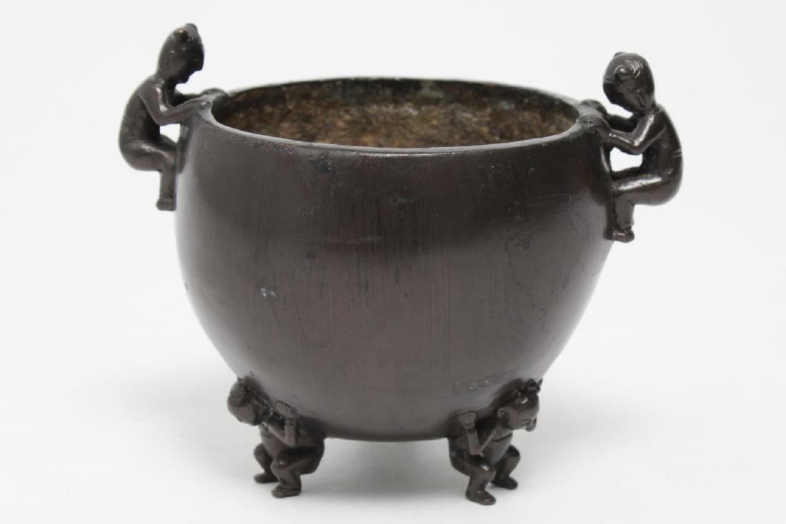 Chinese Bronze Incense Brazier, Brown-Patinated: Chinese patinated bronze incense brazier or censer with cast, applied handles and feet in the shape of boys, the underside with unknown impressed mark, vintage. 4.85" H over handles X 5.75" diameter o