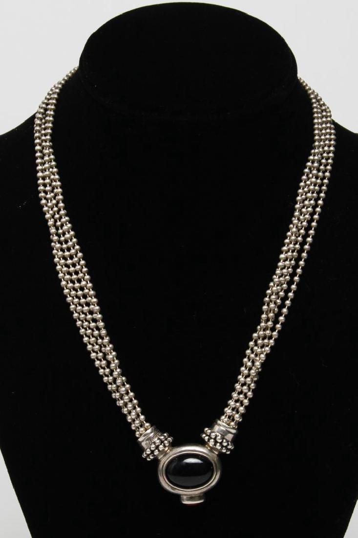 Joseph Esposito Silver, Onyx, & Amber Necklace: Joseph Esposito necklace in sterling silver, mounting onyx and amber cabochons at center; the chain mounts and reverse of pendant marked "925 Espo Sig." 17" L. Approx. 1.7 ozt. total (including stones