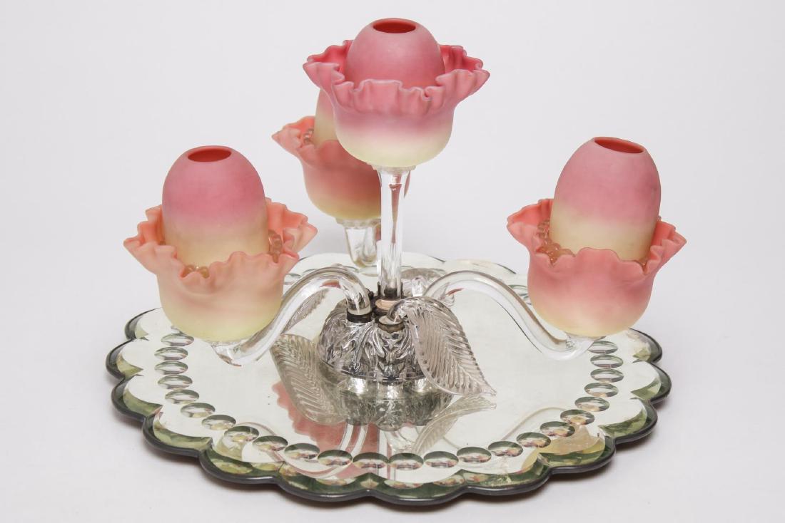 Victorian Clarke Fairy Pyramid Lamp, c. 1885: Rare Victorian English Clarke Fairy Lamp plateau centerpiece, the pink and yellow crimped and fluted Burmese shades set into clear glass lamp cups marked "S Clarke Fairy Pyramid," with matching Burmes