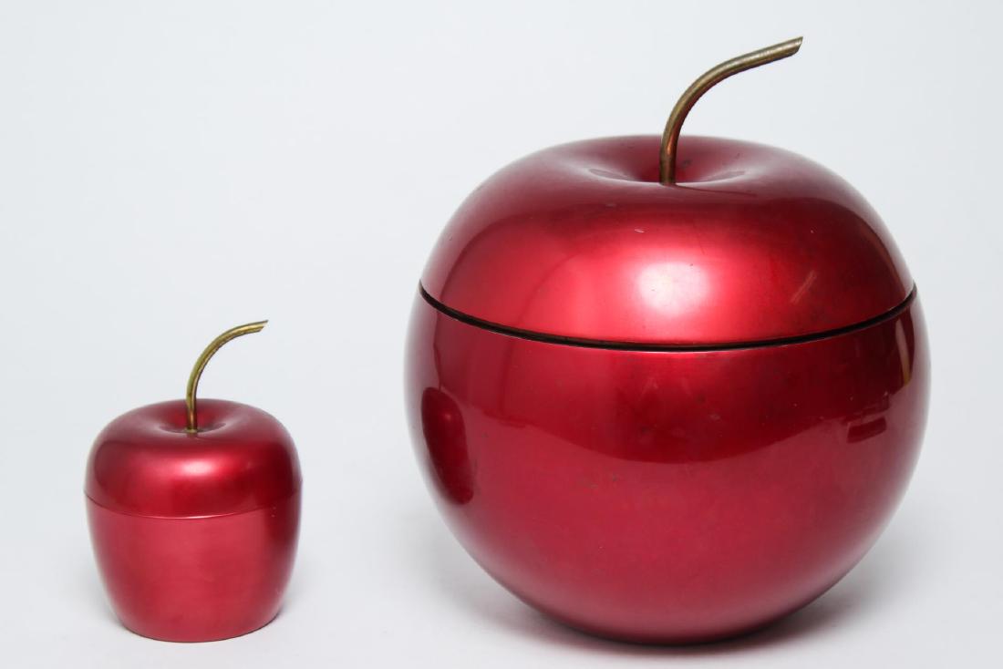 Art Deco Red Apple Ice Bucket & Cigarette Holder: Art Deco Apollo Studios NY red apple-form metal ice bucket #6792, lined with mercury glass, and brass-lined cigarette holder #A1183, both vintage 1920s. Larger: 9.5" H X 7.5" diameter. Contact wear to