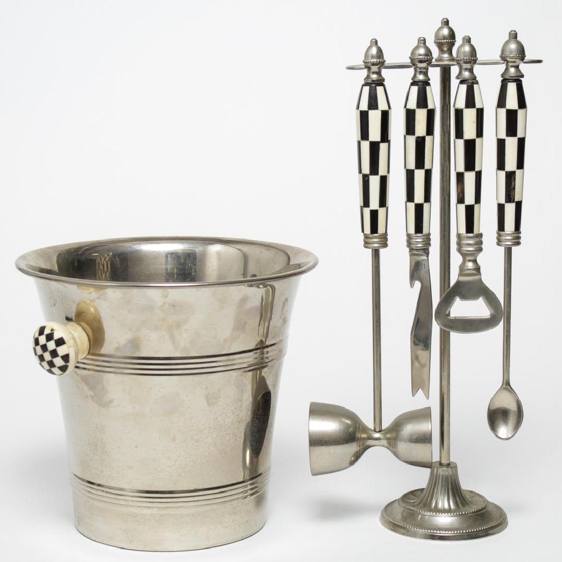 Ice Bucket & Bar Tools Set, Silver-Tone Metal: Silver-tone metal ice bucket and bar tools set, with black-and-white check handles; a citrus bar knife, stirring spoon, double jigger, and bottle opener, on hanging stand. Tallest: 14.5".