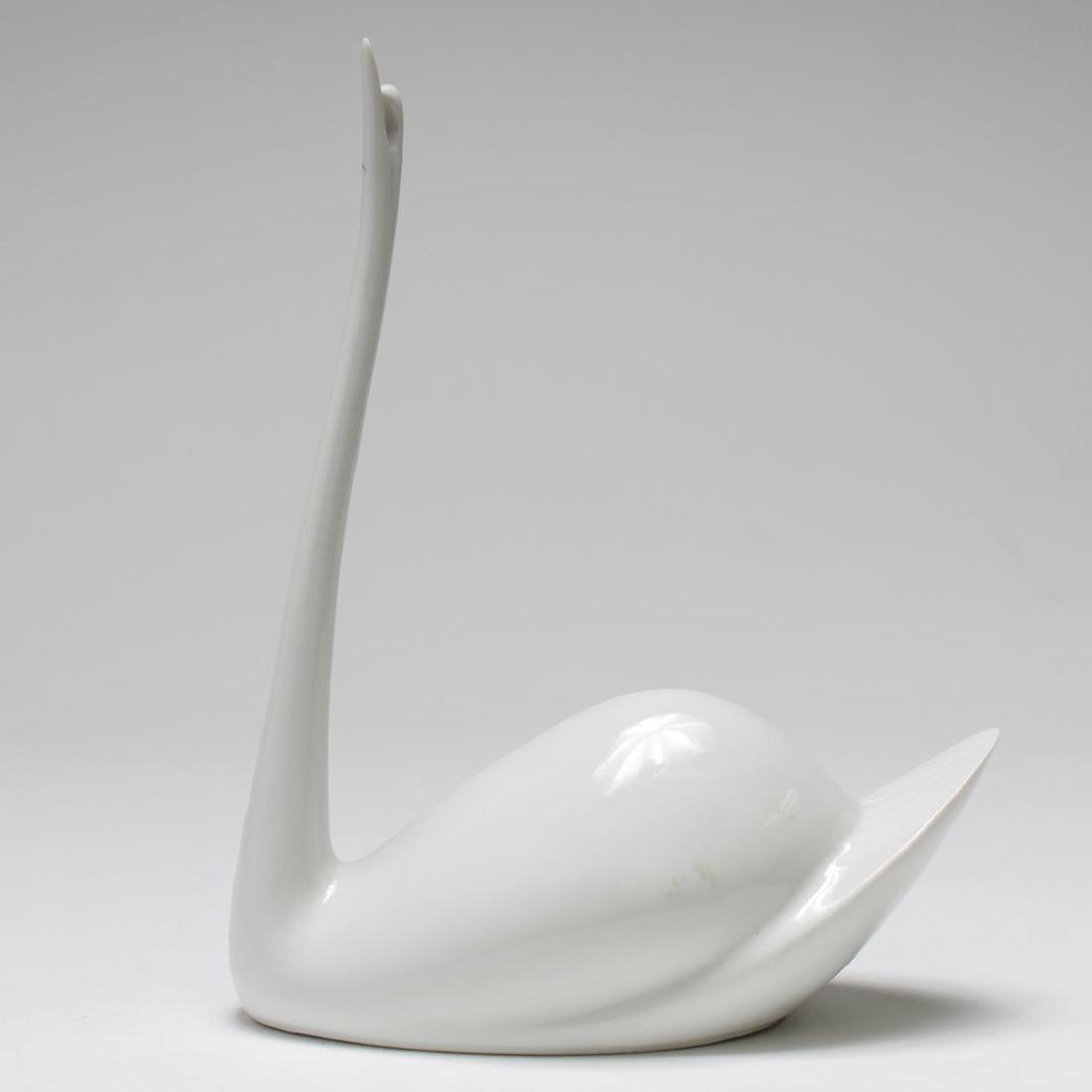 Royal Dux Czech Bohemia Porcelain Swan, Modernist: Mid-Century Modern Royal Dux Czech Bohemia porcelain swan, vintage 1950s, the streamlined bird with elongated neck, the underside factory stamped "Hand Painted / Royal Dux Bohemia / Made in Czechoslov